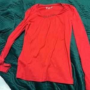 Red, long sleeve shirt with detail around neck